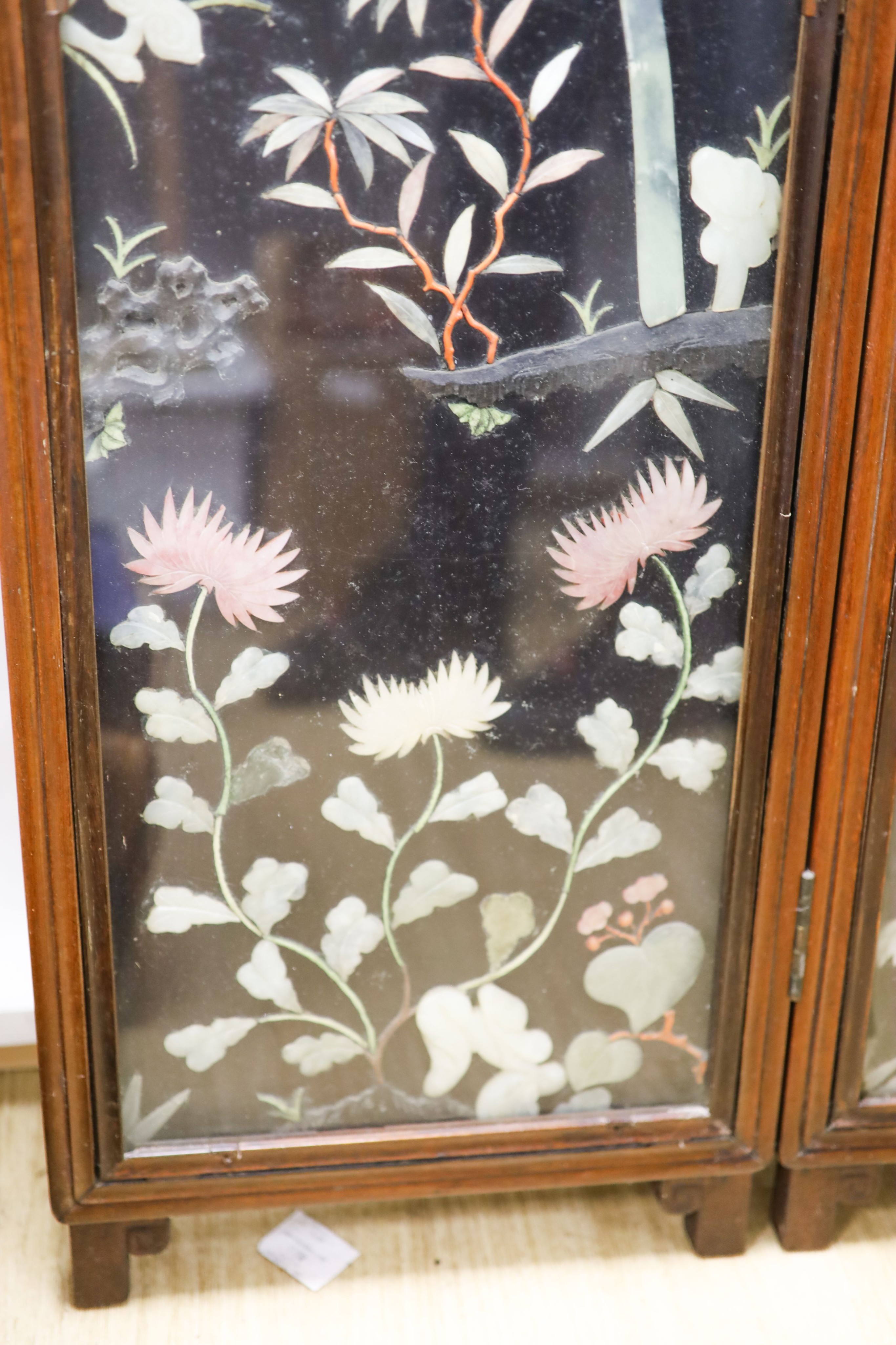 A Chinese soapstone mounted bifold screen 116cm